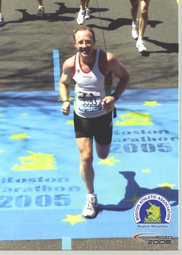 Jeff crossing the finish line at the 2005 Boston Marathon. He is smiling but he was exhausted!