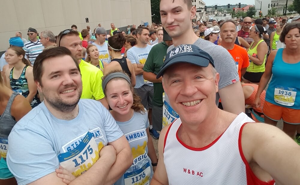 Jeff, his daughter Katie, and her husband Chris smiling for a group selfie at the 2017 Steamboat Classic